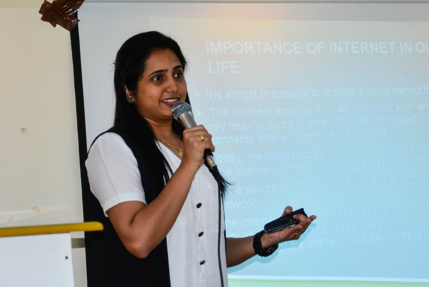 Harsha Sreehari giving a talk on the importance of the internet in everyday life